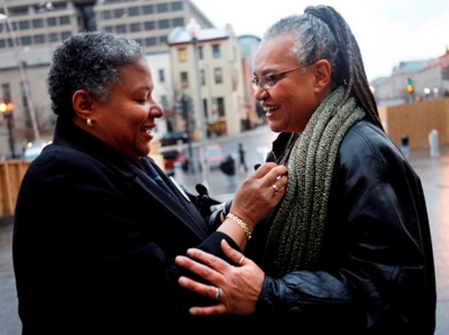 Couples arrive at Superior Court to obtain their marriage licenses after the District of Columbia legalized gay marriage in Washington, on Wednesday, March 3, 2010. (AP Photo/Jacquelyn Martin)