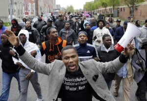 Protesters in Baltimore marching for justice for Freddie Gray