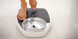 Person standing on a weighing scale