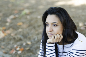 Frustrated young person contemplating their thoughts