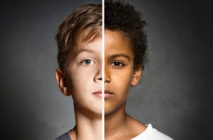 Two children of different races are shown together