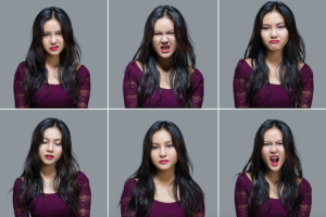 Multiple images of the same person, making disgusted faces