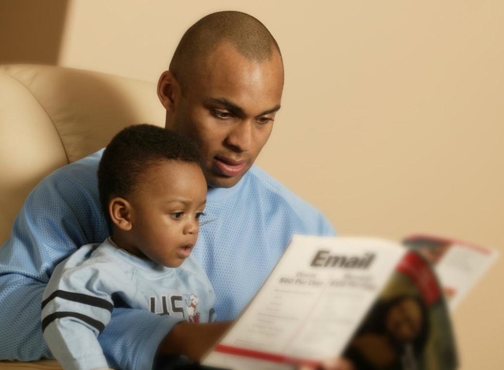 A parent reading to their child