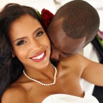 A couple kissing on their wedding day