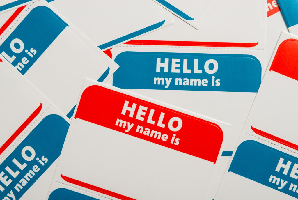 Pile of "Hello, my name is _____" labels