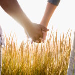 Couple holding hands