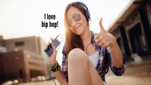 Person listening to music, giving a thumbs up. The words "I love hip hop!" appear next to their head.