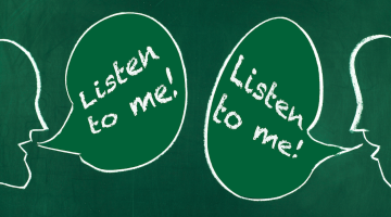 Heads drawn on a chalkboard, each saying "Listen to me!"