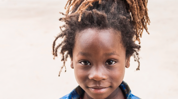 Child with dreadlocks