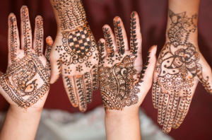 A group of people with mehndi