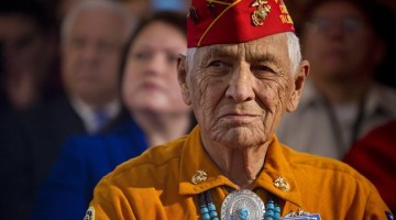 American member of the Navajo Code Talkers, Roy Hawthorne, listen as US President Barack Obama speaks during the White House Tribal Nations Conference at the Department of the Interior in Washington, DC.