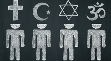 On a chalkboard, people are drawn with their heads representing some major world religions: Christianity, Islam, Judaism, and Hinduism.