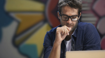 Person reading at their computer